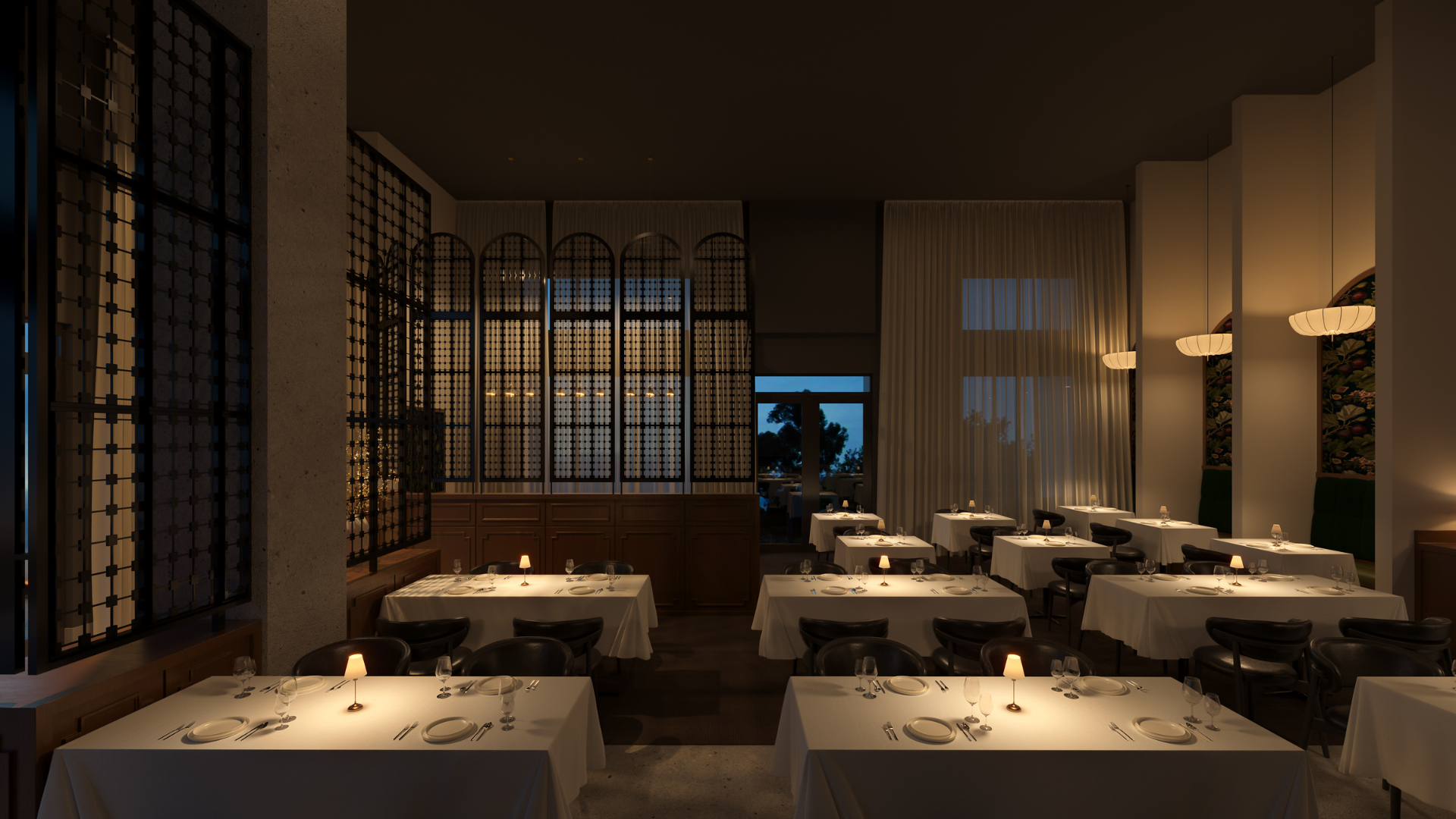 A dimly lit modern restaurant interior with multiple dining tables set with white tablecloths, lit candles, and glassware. The space features warm ambient lighting, dark wood screens, and tall windows with curtains.